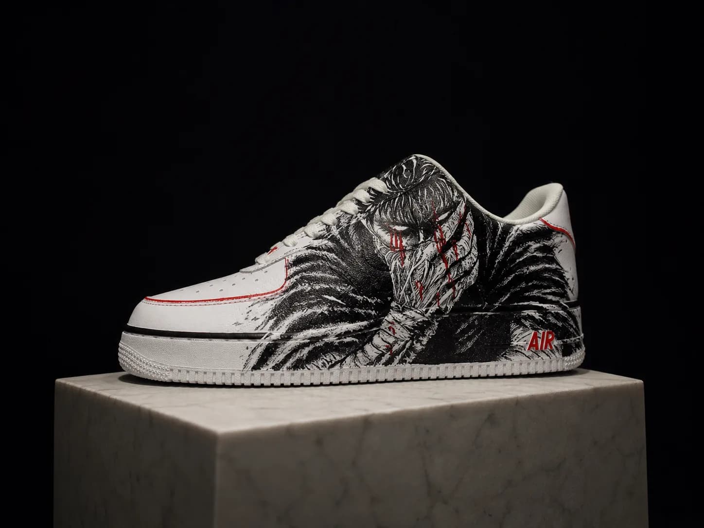 A hand-inked pair exhibited on a marble plinth against a black void